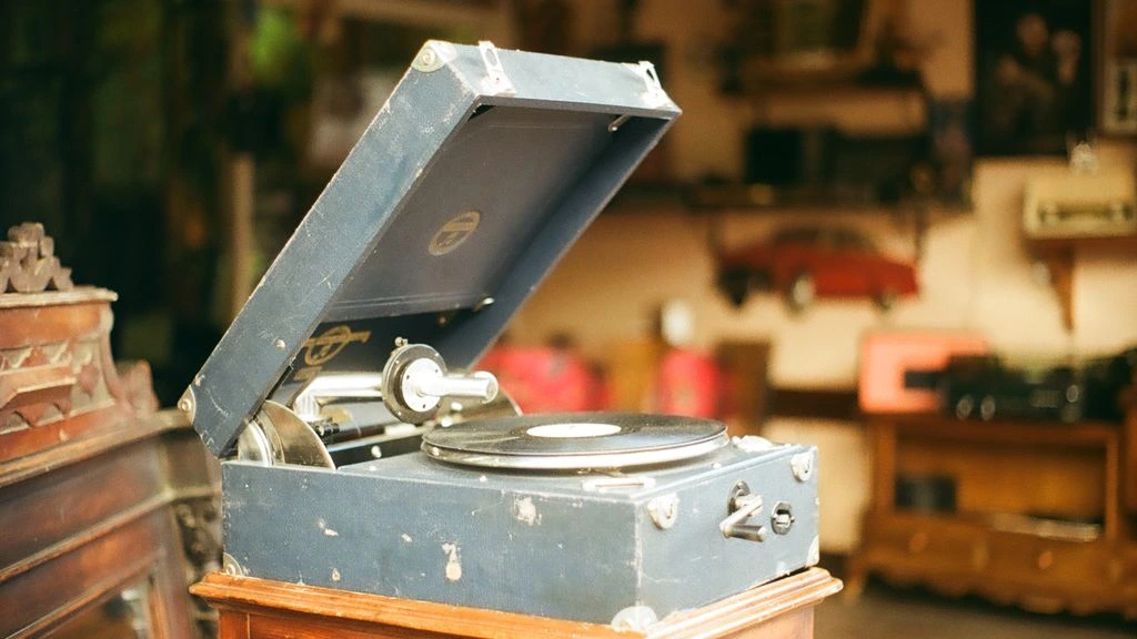 Vinyl record playing in a warm sunbeam.